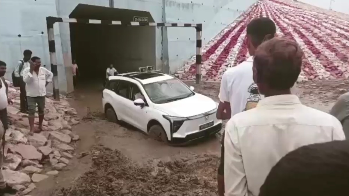Video: UP MLA's car stuck in muddy road in own constituency, locals rescue him