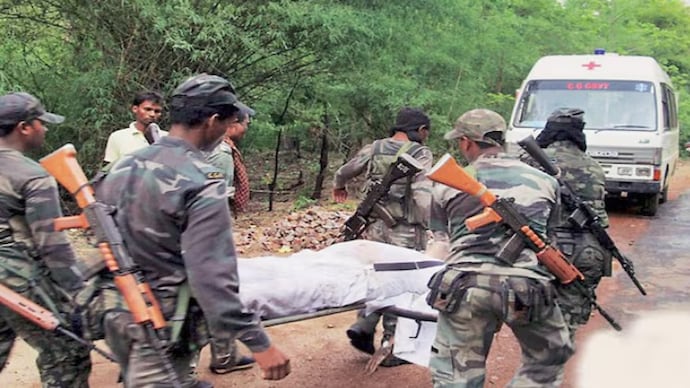 A file photo of security forces at the spot of Maoist attack which took place on May 25, 2013.
