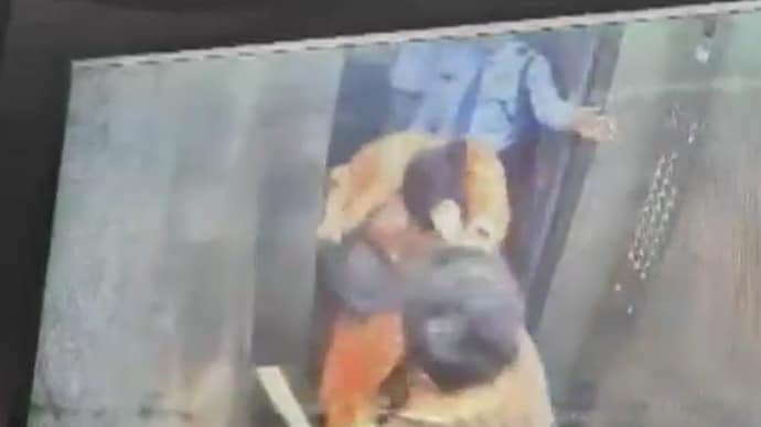 A society security guard can also be seen attempting to intervene and bring the situation under control. (CCTV Screengrab)