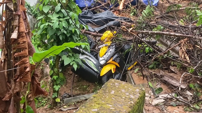 A woman was killed after a landslide fell on her scooter. A woman was killed after a landslide fell on her scooter.