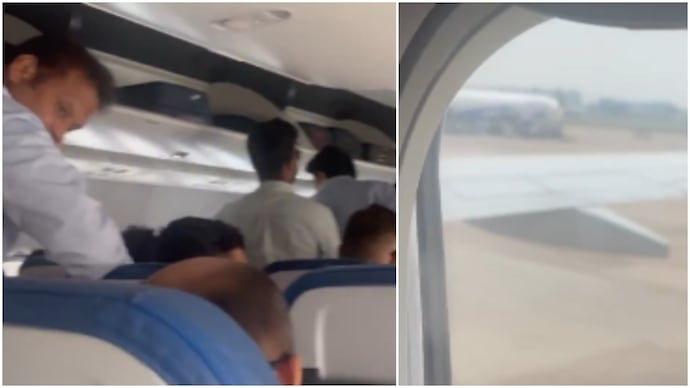 Air India Express passengers seen standing as flight moves on runway (Photos: Amitava Das/X) Air India Express passengers seen standing as flight moves on runway