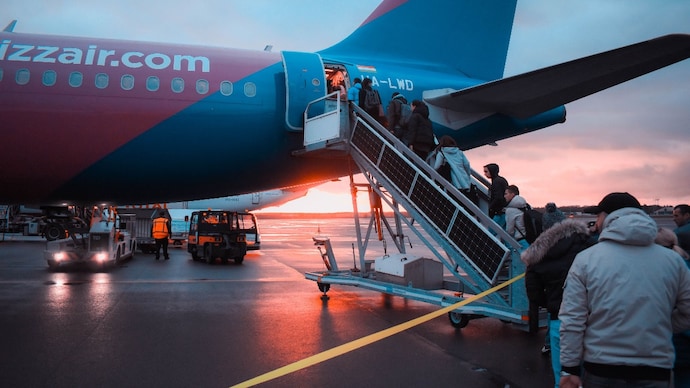 Airlines cannot simply bump passengers with confirmed tickets without consequences. Here is what DGCA denied boarding rules say about compensation, refunds and passenger rights. (Representative Image: Pexels) Airlines cannot simply bump passengers with confirmed tickets without consequences. Here is what DGCA denied boarding rules say about compensation, refunds and passenger rights. (Representative Image: Pexels)