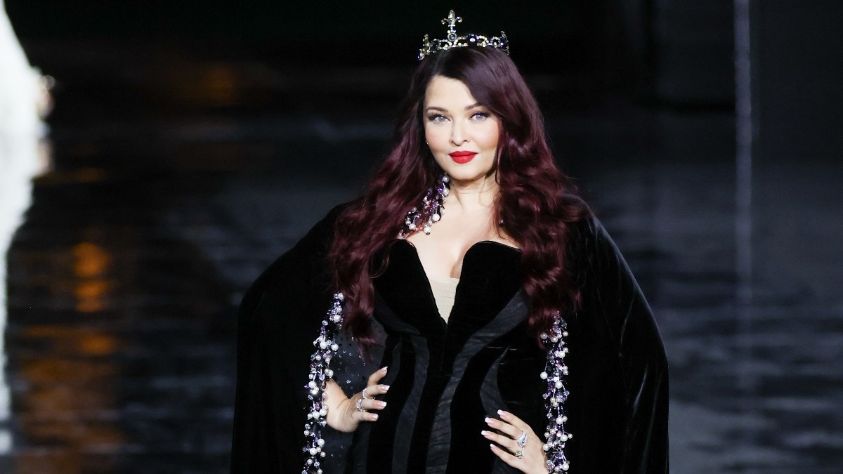 Aishwarya Rai Bachchan owns the Paris runway in red hair, starry cape gown