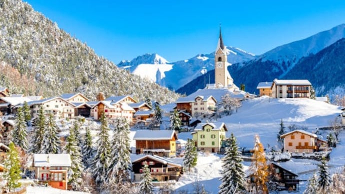 Alpine village covered with snow, Swiss Alps Sewitzerland