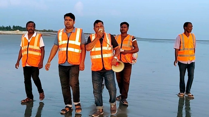 Civil defence personnel make announcement at a beach. (PTI/Representational)