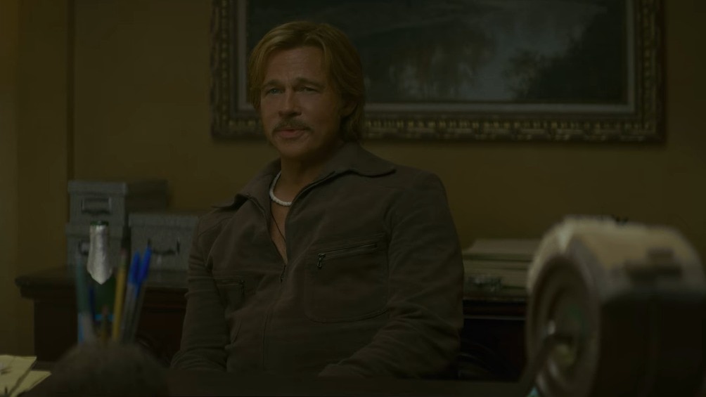 Brad Pitt's Cliff Booth moves past his stint as Rick Dalton's stunt double in director Quentin Tarantino's The Further Mis-Adventures of Cliff Booth. (Credit: Netflix) Brad Pitt's Cliff Booth trades stunt work for studio fixing in new film trailer