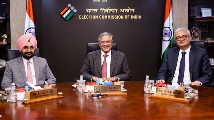 Chief Election Commissioner Gyanesh Kumar (C), with Election Commissioners SS Sandhu (L) and Vivek Joshi during a meeting with TMC delegation members in April. (Image: X/@ECISVEEP) Chief Election Commissioner Gyanesh Kumar (C), with Election Commissioners SS Sandhu (L) and Vivek Joshi during a meeting with TMC delegation members in April. (Image: X/@ECISVEEP)