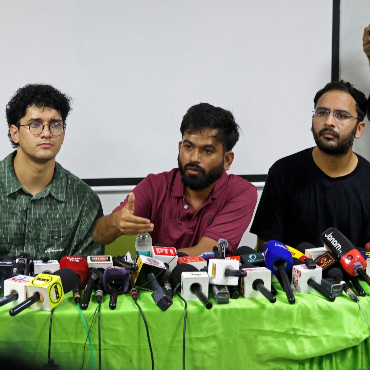 Cockroach Janta Party's Abhijeet Dipke (C), Saurav Das, (L), and Ashuthosh Ranka held a press conference in New Delhi. (Image: Reuters)