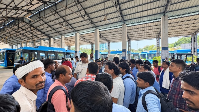 Contractual DTC drivers at a depot during their protest in Delhi. (Image: Avinash Kateel) Contractual drivers in Kalkaji Depot speaking to DTC officials of tendering mass resignation. (Image: Avinash Kateel)