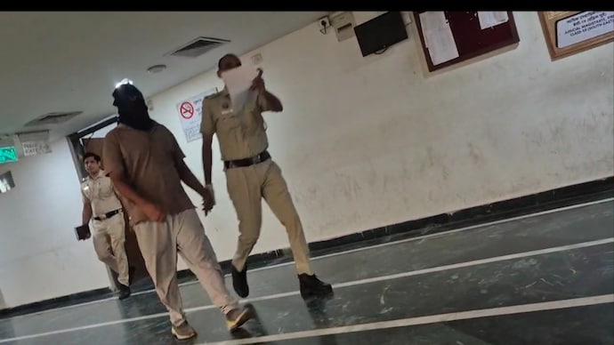 One of the accused being taken to court Delhi teen recounts Astha Kunj ordeal