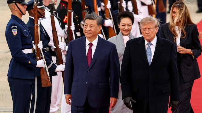 US President Donald Trump and US first lady Melania Trump walk with China's President Xi Jinping and his wife Peng Liyuan upon their arrival at Joint Base Andrews. (Photo: Reuters) US President Donald Trump and US first lady Melania Trump walk with China's President Xi Jinping and his wife Peng Liyuan upon their arrival at Joint Base Andrews