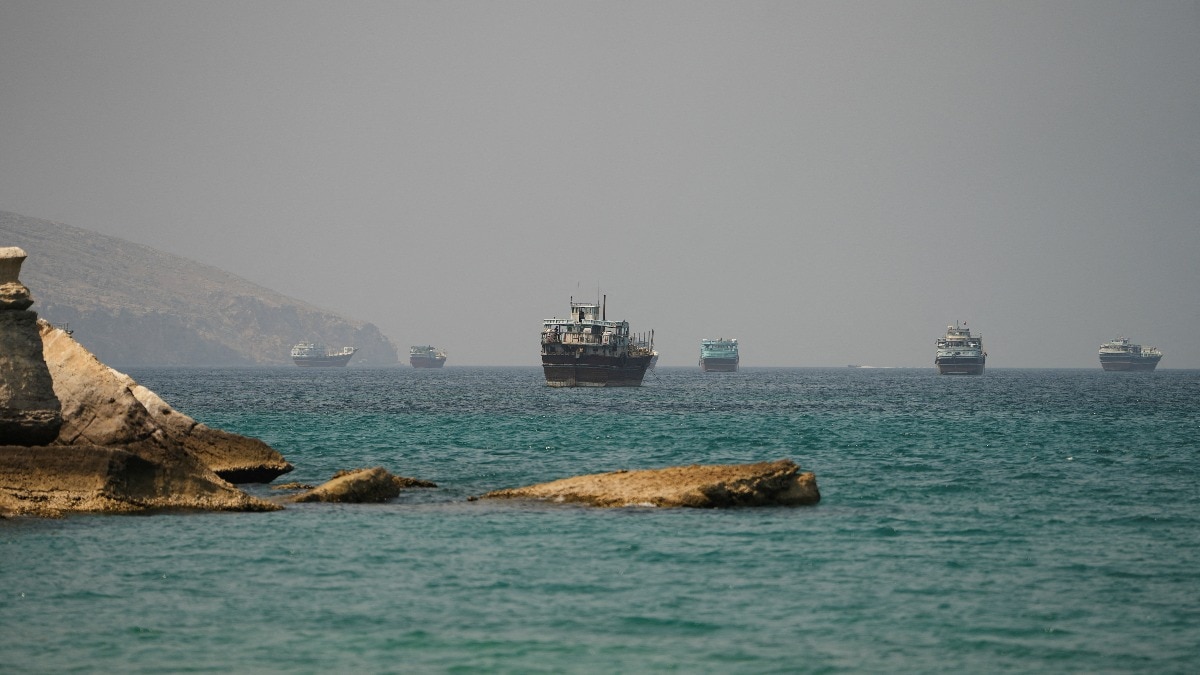 The latest proposal points to renewed diplomatic activity, though mistrust and the collapse of an earlier understanding continue to weigh on the process. (Credits: Reuters) Vessels at the Strait of Hormuz, as seen from Musandam, Oman