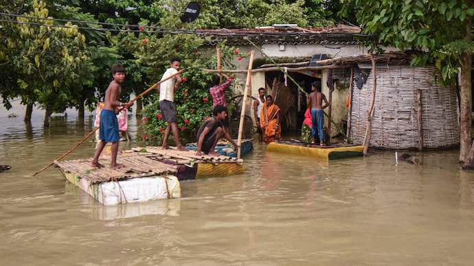 Houses lie partially submerged in floodwaters following a rise in the water level of the Ganga river in Patna. (PTI) Houses lie partially submerged in floodwaters following a rise in the water level of the Ganga river in Patna. (PTI)