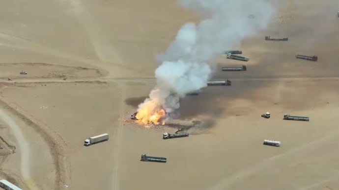Footage released after the attacks captured the violent moment a fragmentation missile struck trucks carrying military equipment, triggering a series of explosions. (Photo: Reuters)
