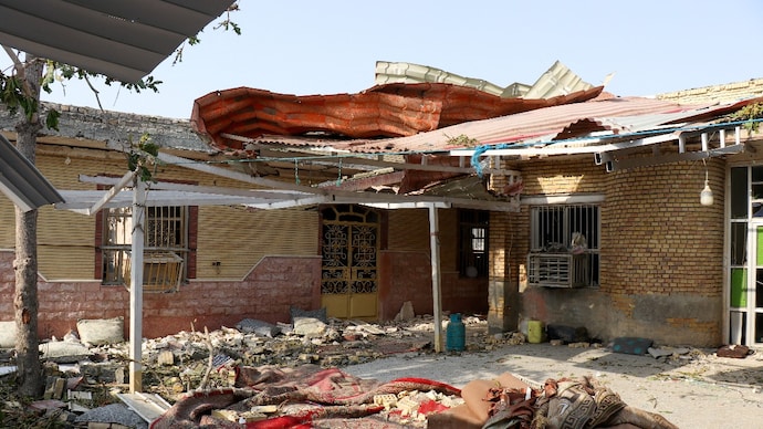 Rubble lies around a damaged house following the attack near a wedding gathering in Kuhistik, Sirik, Iran, September 2, 2026.