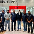 Karamveer Singh with Punjab Police officials at the Delhi Airport. Karamveer Singh with Punjab Police officials at the Delhi Airport.