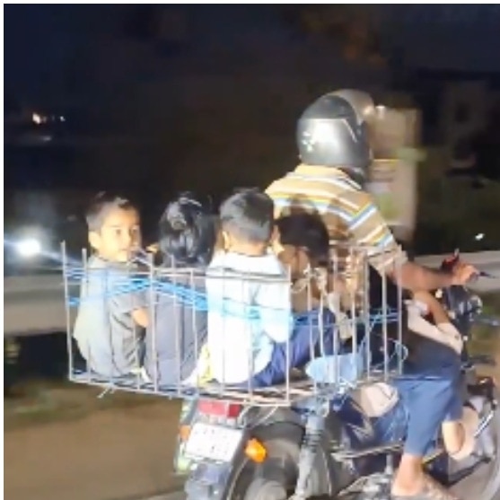 Karnataka man rides with 5 children packed into metal basket, one seated in front