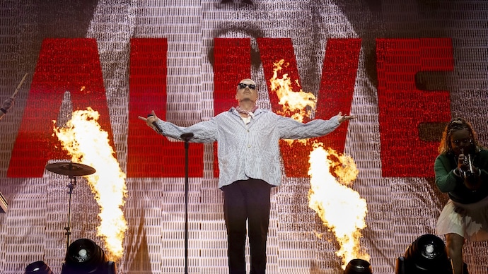 Rapper Macklemore pledged $1 million from Ed Sheeran tour and asked US promoter Robert Kraft to match his donation. (Photo credit: Anthony Anex/Keystone via AP) Macklemore's photo