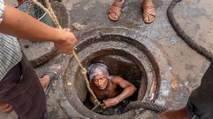 Entering a manhole or a sewer line is a centuries-old practice that has been decreed illegal in India through several Supreme Court judgments. (Photo: PTI) Manual scavenging
