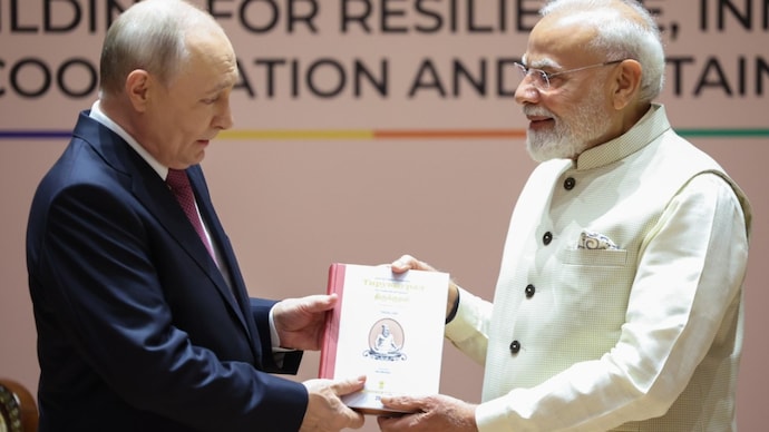 PM Modi gifts Thirukkural to Russian President Vladimir Putin Modi gifts Putin Thirukkural