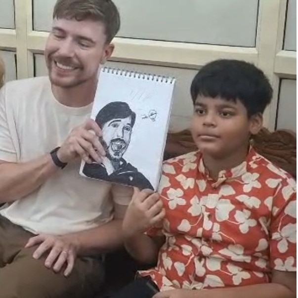 MrBeast visits Taj Mahal with wife in Agra, young fan gives him handmade sketchbook