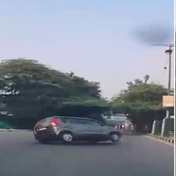 Passenger's miraculous escape as car overturns after driver loses control in Delhi