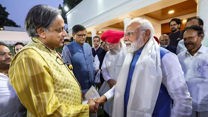 Congress MP Shashi Tharoor and Prime Minister Narendra Modi. PM Modi meet Congress MP Shashi Tharoor