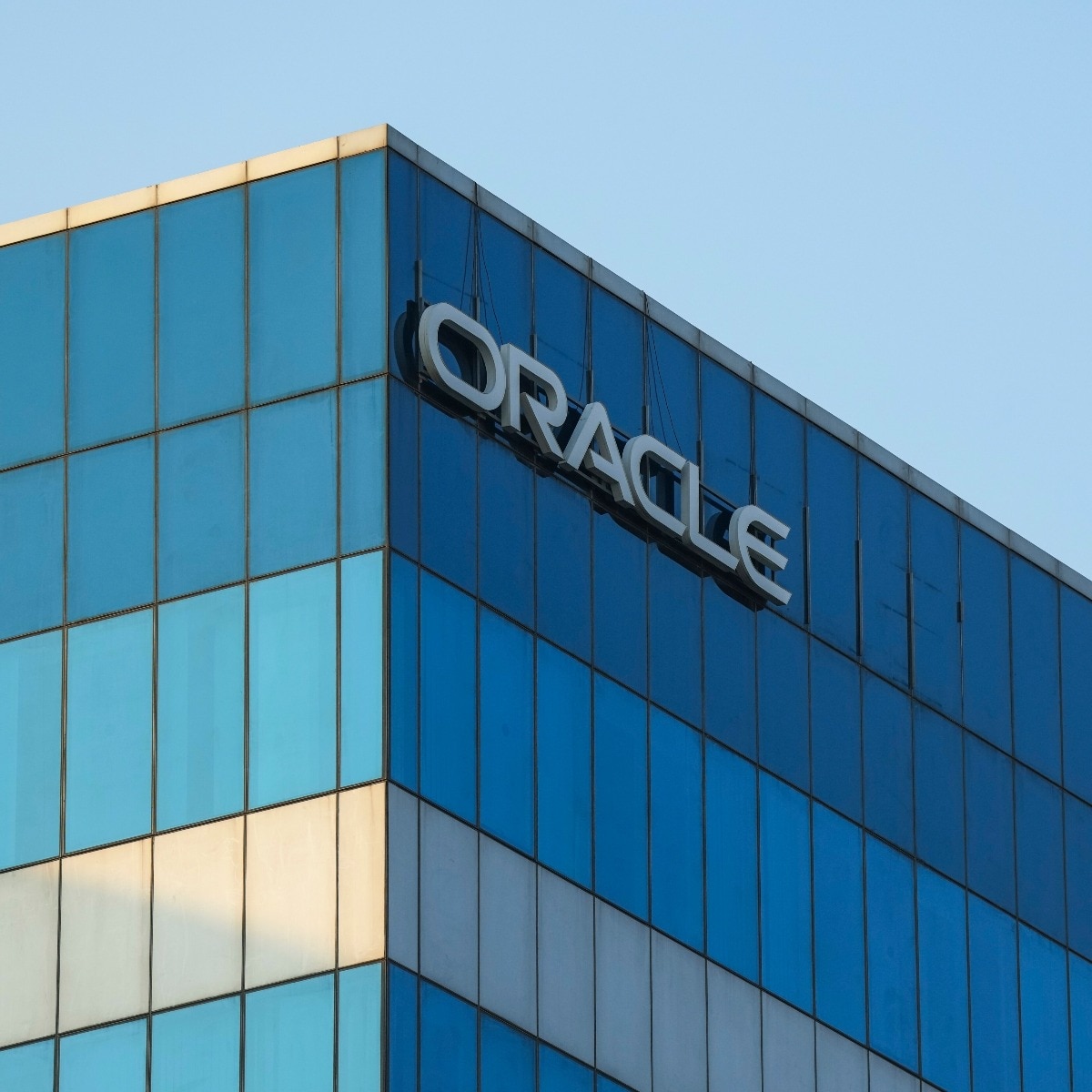 Laid off after 12 years at Oracle, employee likes it because no more 13-hrs shift or micromanagement