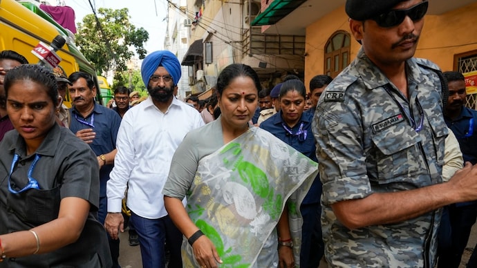 Delhi Chief Minister Rekha Gupta at the site of the collapsed PG in south Delhi's Satya Niketan earlier this month.