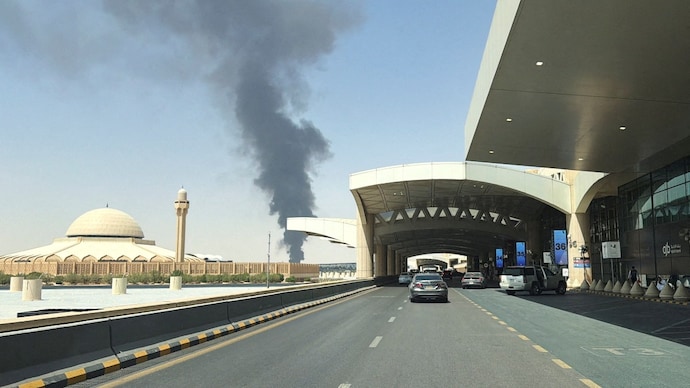 Large plume of black smoke rises from the fuel storage area at King Khalid Airport, in Riyadh, Saudi Arabia. ( Photo- Reuters)