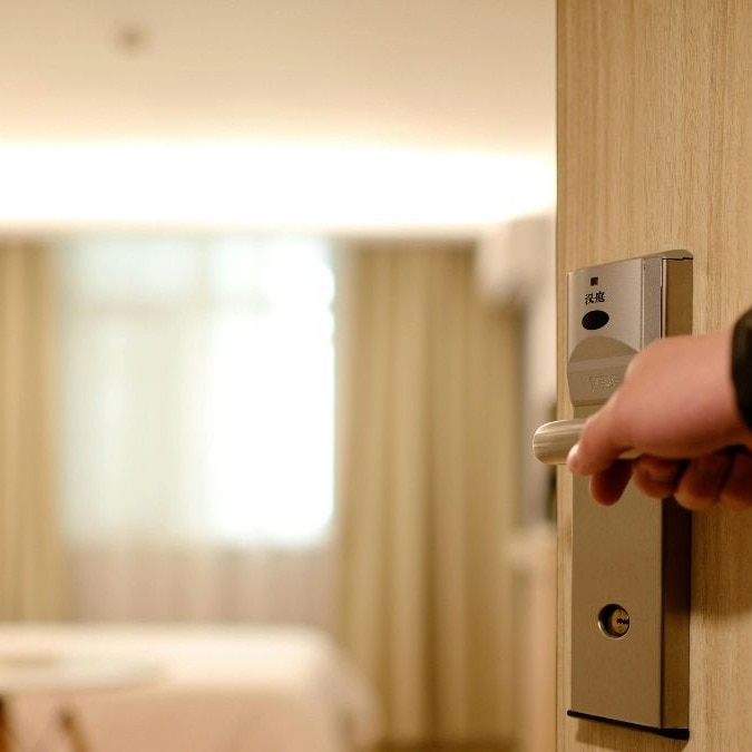 What happens inside a hotel before a guest checks in?