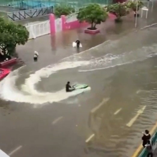 Watch: Thai man rides jet ski through flooded Bangkok streets, gets arrested