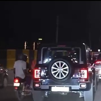 Thar knocks down biker in Delhi, speeds away. Road rage caught on dashcam