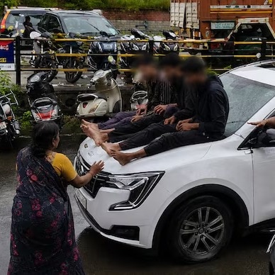 Human rights panel seeks FIR against Pune cops over minors tied to police car bonnet