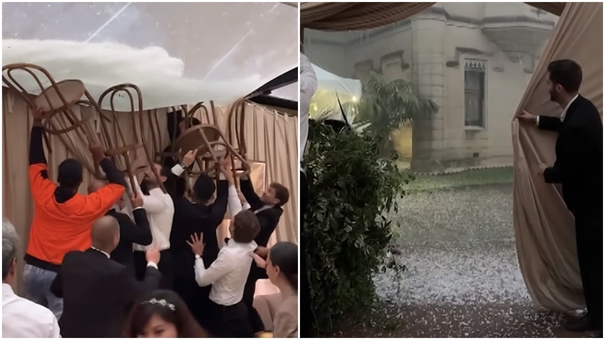 Australia wedding guests use chairs in desperate bid to stop venue from flooding