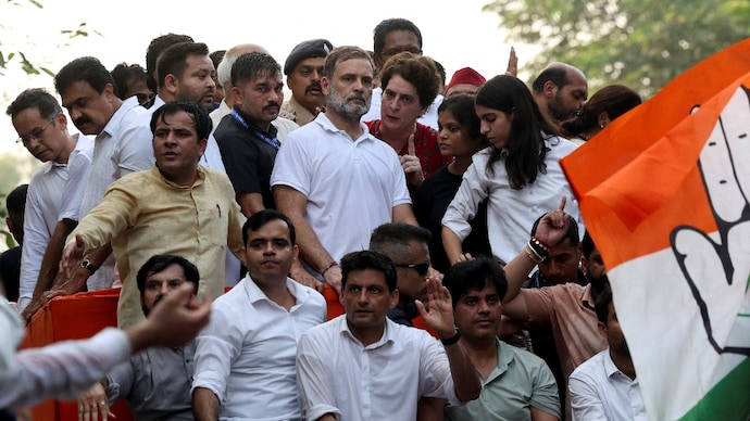 Leader of the Opposition Rahul Gandhi stands next to Priyanka Gandhi, as opposition parties march to the Supreme Court to protest a controversial revision of voter lists that has sparked days of unrest. (Credits: REUTERS)