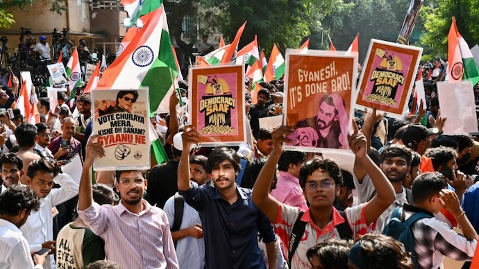 The Commission has also sought an examination of the circulation of photographs and videos involving the children, including the accounts responsible for disseminating the material. (Credits: X) ‘Democracy saaf’: Mumbai protesters get creative with anti-Gyanesh Kumar placards