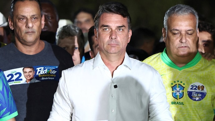Flavio Bolsonaro, from the US, first declared himself Brazil’s rightful president-elect after losing the election, then changed his claim to calling himself the country’s “leader”. (Reuters)