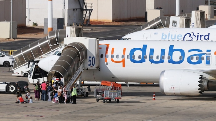 Passengers board a FlyDubai aircraft at Ben Gurion International Airport near Tel Aviv, Israel on Wednesday. (Photo: Reuters)