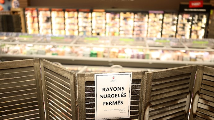 View of the closed frozen food aisle at a supermarket near Nantes after a cyberattack targeted refrigeration systems at French supermarket chains, causing food losses and fires at several stores. ( Photo- Reuters)