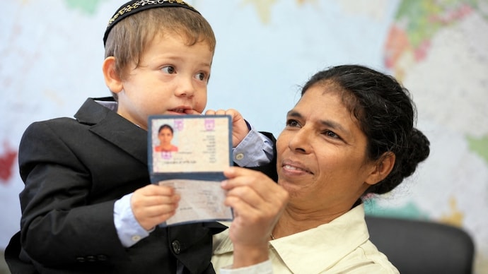 Sandra Samuel, an Indian, rescued two-year-old Moshe Holtzberg from Chabad House during the 26/11 Mumbai terror attacks. (Image: AFP) moshe holtzberg nanny sandra samuel 26 11 attacks mumbai let terrorists pakistan jewish israeli targets captain smit machchhar flydubai pilot saves lives president benjamin netanyahu