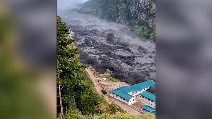 A debris-laden flash flood on the Budhi Gandaki in Nepal's Gorkha district swept away houses.