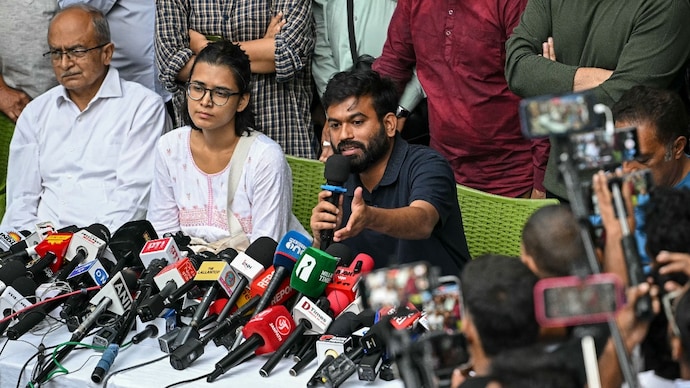 Neha Bora and Abhijeet Dipke (File photo) Prashant Bhushan, Neha Bora and Abhijeet Dipke