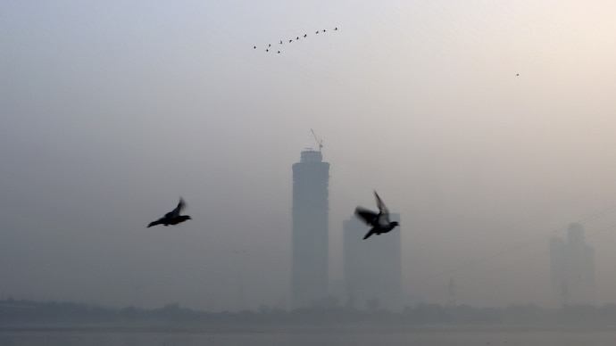 High-rise buildings engulfed in a layer of smog, in New Delhi. (Photo: PTI) Smog season begins: Can new anti-pollution measures help Delhi breathe?