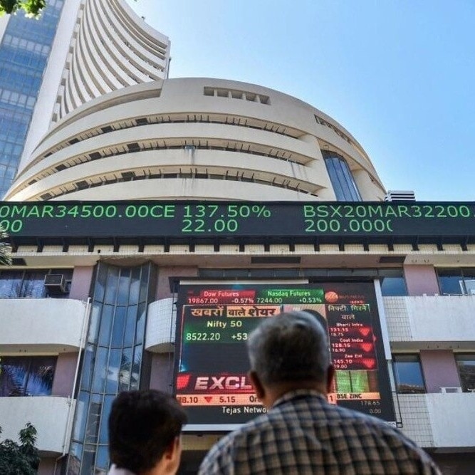 Sensex, Nifty open lower as FII selling offsets relief from softer crude