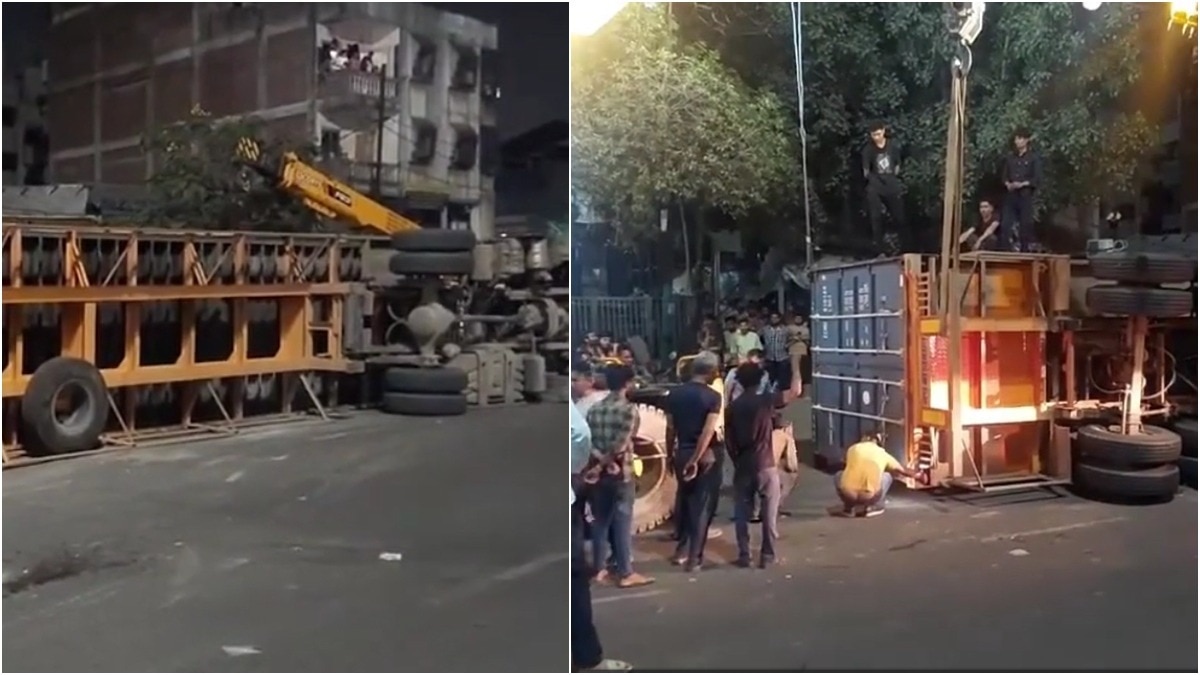 Gujarat couple escapes death by seconds as massive truck topples on their bike