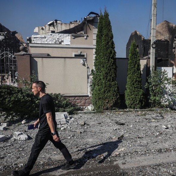 1 killed in Russian strikes on Kyiv as drones hit school, bridges