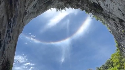 Waterfall Appears to Fall from Rainbow in Brazilian Cave