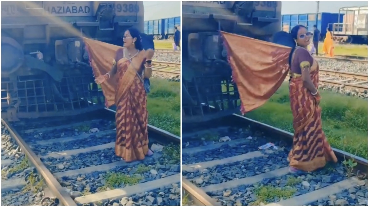 Woman ties her pallu to stationary train, breaks into dramatic dance on tracks