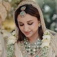Parineeti Chopra's bridal outfit reminded us of Priyanka Chopra's white wedding gown. Parineeti Chopra's bridal outfit reminded us of Priyanka Chopra's white wedding gown.